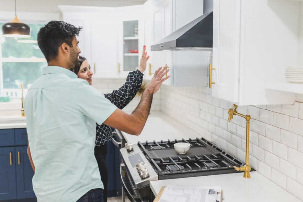 Should You Attend the Home Inspection? 2 buyers explore the home during a home inspection.