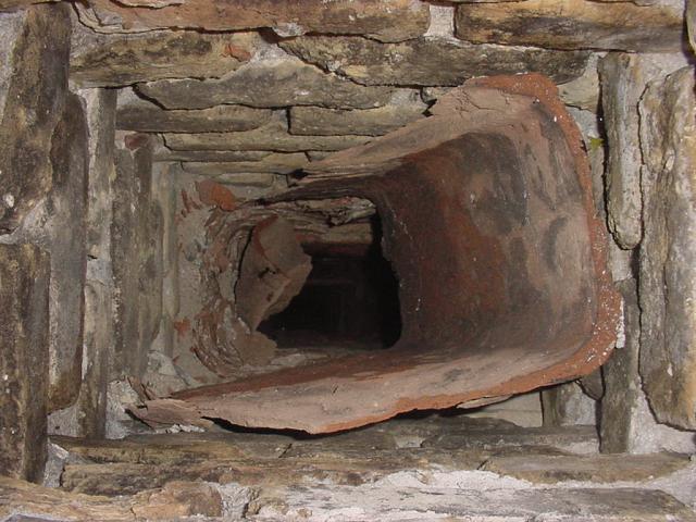 Damaged chimney tile